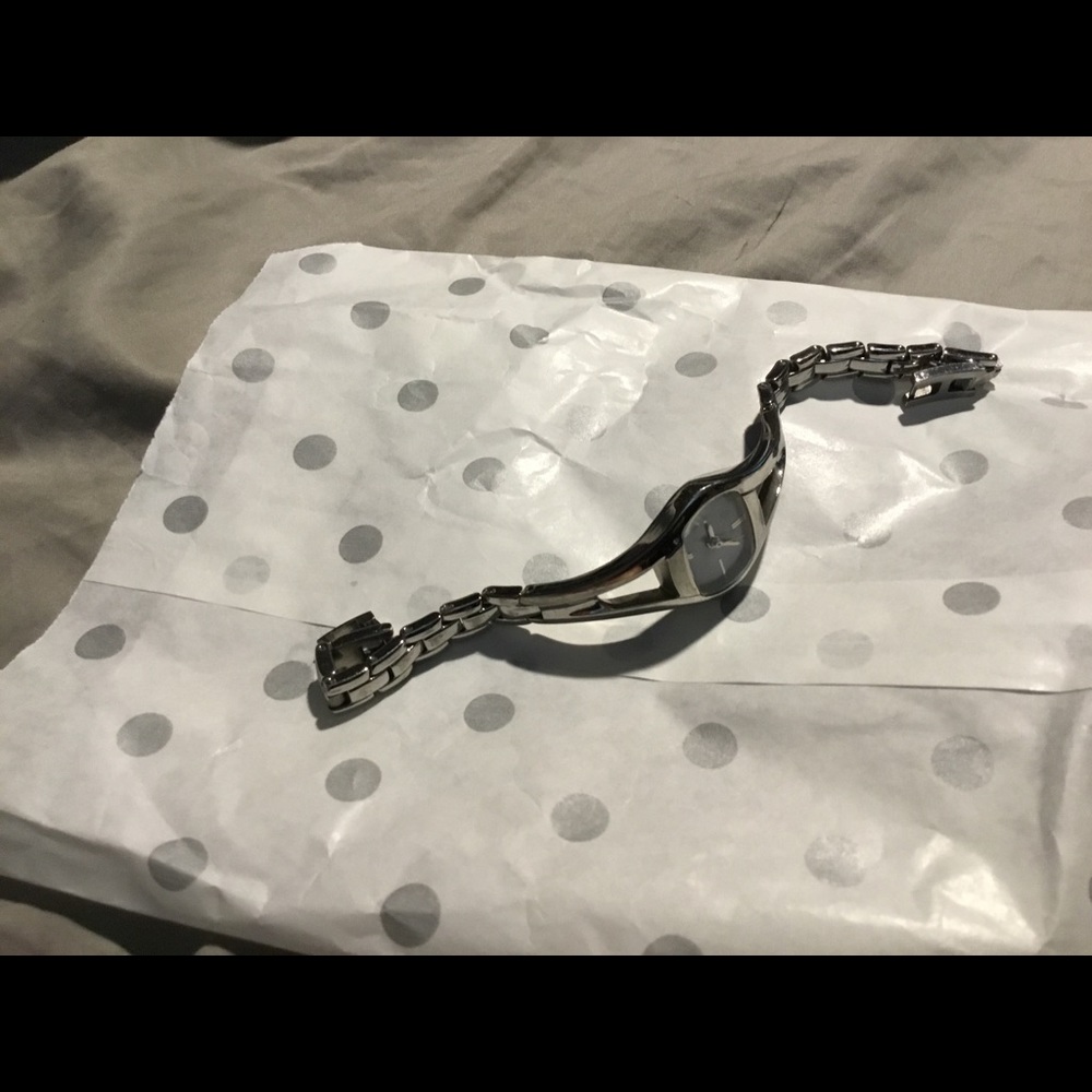 Silver tone watch
